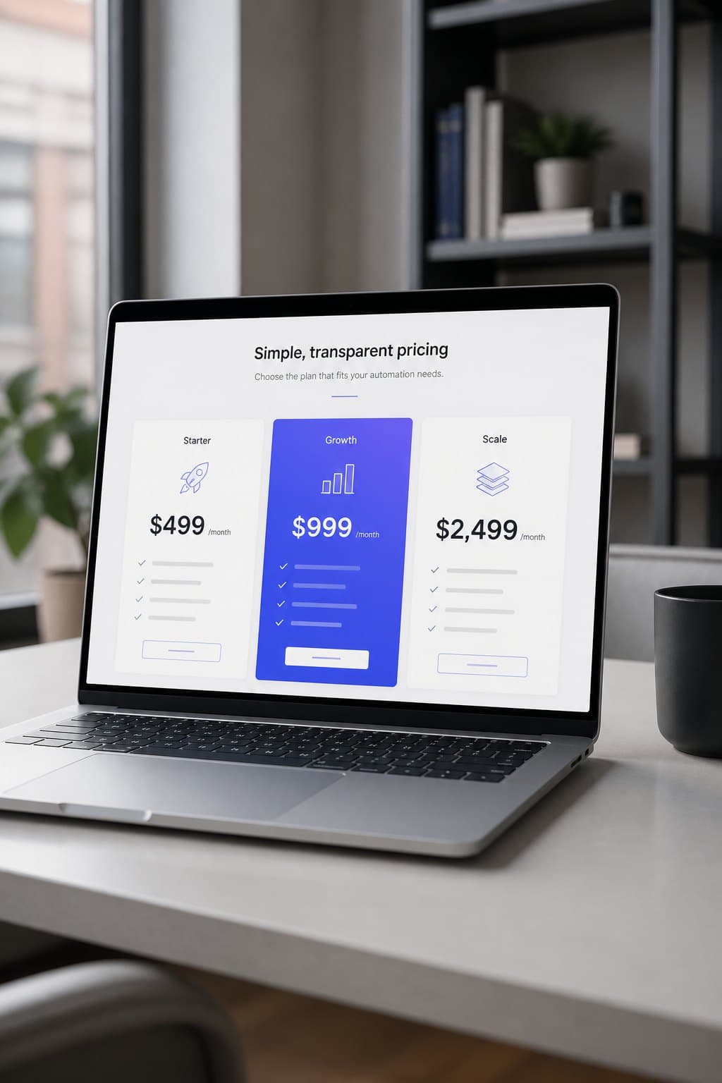 Laptop showing Starter, Growth, and Scale pricing on a desk